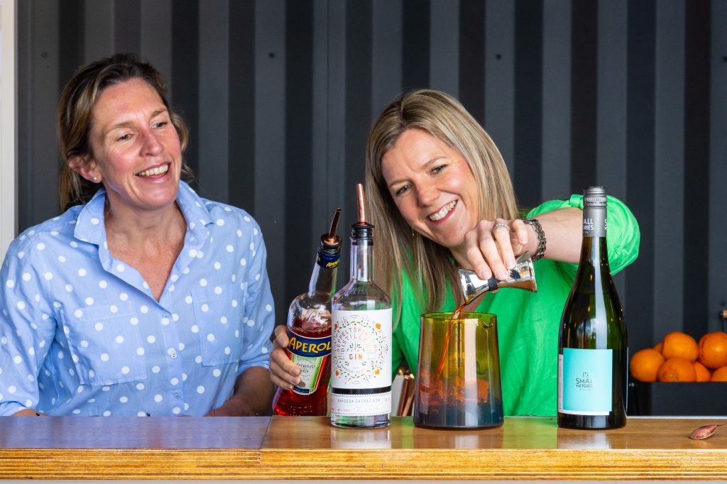Jules and Bec Ashmead making a S.V. Negroni Small Victories wine and gin cocktail
